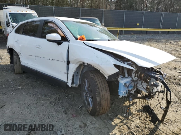 2022 Mazda CX-9 Sport with VIN JM3TCBBY5N0606296, listed as a Copart auction lot 80864034 with 0 mi miles and Salvage Title. Bid and sale history available at carsss.com. Image 4.