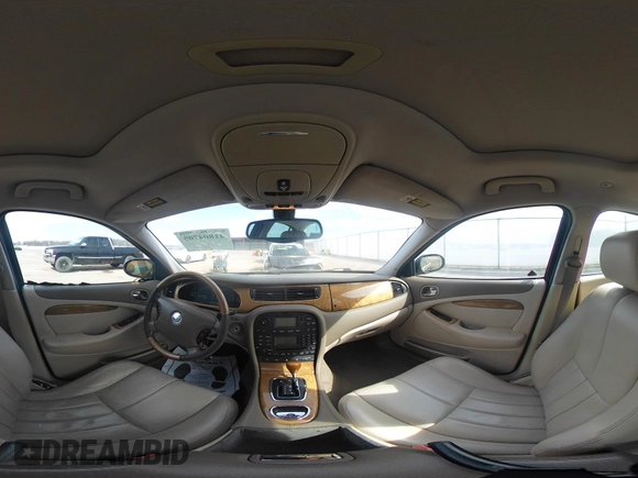 2003 Jaguar S-Type with VIN SAJEA01T93FM64497, listed as a IAAI auction lot 41804705 with 224,978 mi miles and . Bid and sale history available at DreamBid. Image 18.