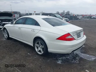 2009 Mercedes-Benz CLS-Class 5.5L with VIN WDDDJ72X79A140979, listed as a IAAI auction lot 41802317 with 195,968 mi miles. Bid and sale history available at carsss.com. Image 3.