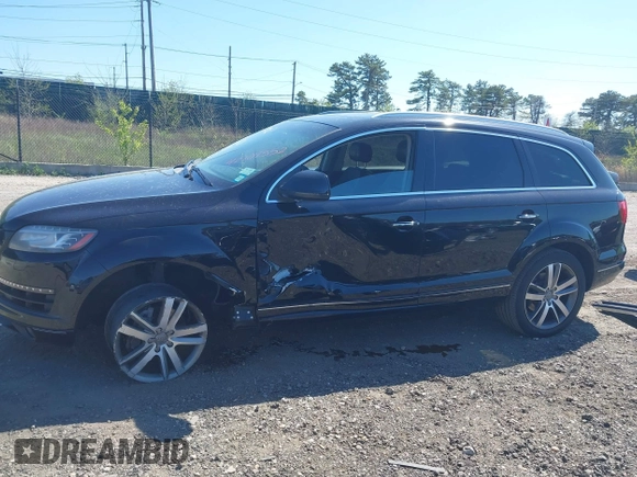 2014 Audi Q7 Premium Plus with VIN WA1LGAFE5ED014701, listed as a IAAI auction lot 42107552 with 98,919 mi miles and . Bid and sale history available at DreamBid. Image 14.