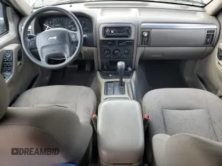 2004 Jeep Grand Cherokee Laredo with VIN 1J4GX48N94C397241, listed as a Copart auction lot 49183315 with 189,099 mi miles and Salvage title. Bid and sale history available at DreamBid. Image 8.