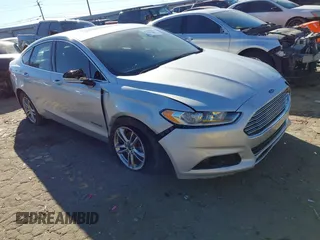 2016 Ford Fusion Titanium Hybrid with VIN 3FA6P0RU7GR364573, listed as a IAAI auction lot 41298298 with 189,900 mi miles. Bid and sale history available at carsss.com. Image 1.