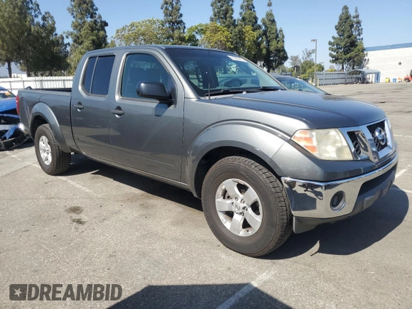 2009 Nissan Frontier LE with VIN 1N6AD09UX9C416211, listed as a Copart auction lot 61655315 with 344,390 mi miles and Salvage title. Bid and sale history available at DreamBid. Image 4.