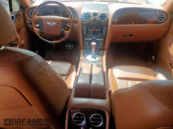 2007 Bentley Flying Spur z VIN SCBBR93W37C050048, wystawiony jako Copart lot #59043815 z przebiegiem 62 006 mil mil oraz Czysty tytuł • Clean title. Historia ofert i sprzedaży dostępna na DreamBid. Obrazek 8.