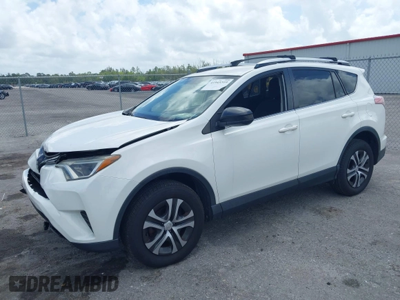 2016 Toyota RAV4 LE with VIN JTMZFREV2GJ096782, listed as a IAAI auction lot 41945319 with 76,866 mi miles. Bid and sale history available at carsss.com. Image 18.