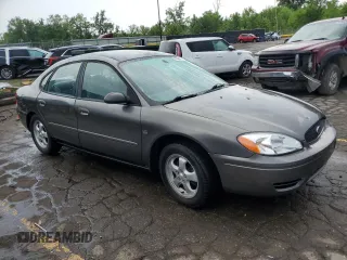 2004 Ford Taurus SES with VIN 1FAFP55S34A202771, listed as a Copart auction lot 61389605 with 180,144 mi miles and Clean title. Bid and sale history available at DreamBid. Image 4.