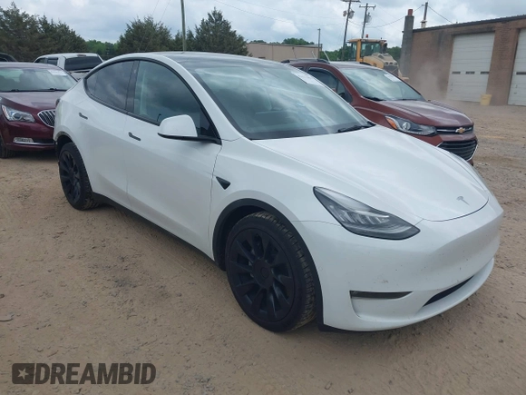 2021 Tesla Model Y Long Range with VIN 5YJYGDEE7MF198867, listed as a IAAI auction lot 42117463 with 79,759 mi miles and . Bid and sale history available at DreamBid. Image 1.