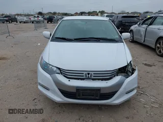 2010 Honda Insight EX with VIN JHMZE2H71AS035091, listed as a IAAI auction lot 41380128 with 181,653 mi miles and . Bid and sale history available at DreamBid. Image 13.