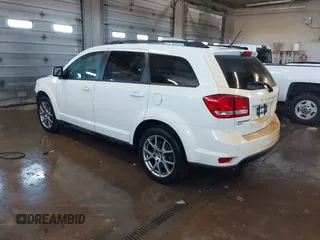 2015 Dodge Journey R/T with VIN 3C4PDDEGXFT574696, listed as a IAAI auction lot 41542460 with 153,044 mi miles and . Bid and sale history available at DreamBid. Image 3.