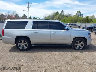 2020 Chevrolet Suburban Premier with VIN 1GNSCJKCXLR219679, listed as a IAAI auction lot 41806579 with 90,132 mi miles. Bid and sale history available at carsss.com. Image 13.