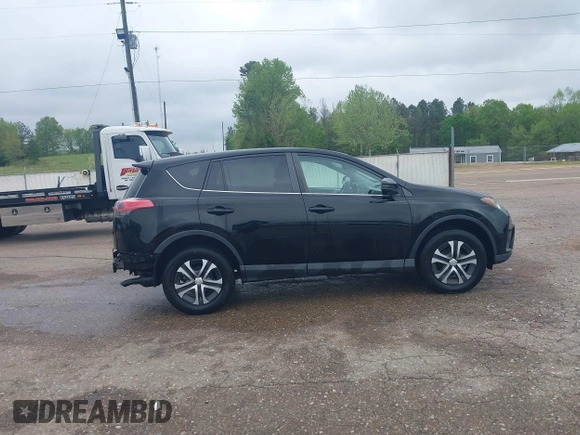 2018 Toyota RAV4 LE with VIN 2T3BFREV8JW777510, listed as a IAAI auction lot 41974675 with 62,795 mi miles. Bid and sale history available at carsss.com. Image 14.