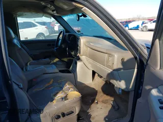 2002 Chevrolet Suburban LT z VIN 1GNEC16Z32J237983, wystawiony jako IAAI lot #41466060 z przebiegiem 260 343 mil mil oraz . Historia ofert i sprzedaży dostępna na DreamBid. Obrazek 5.