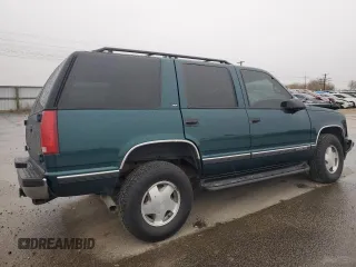 1999 GMC Yukon with VIN 1GKEK13R8XJ798496, listed as a Copart auction lot 81506634 with 117,726 mi miles and Salvage Title. Bid and sale history available at carsss.com. Image 3.