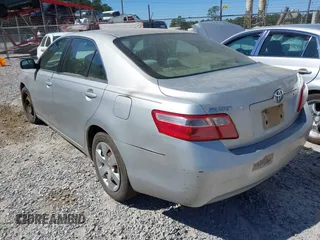 2007 Toyota Camry CE with VIN 4T1BE46K57U643632, listed as a IAAI auction lot 41851036 with 300,010 mi miles. Bid and sale history available at carsss.com. Image 3.