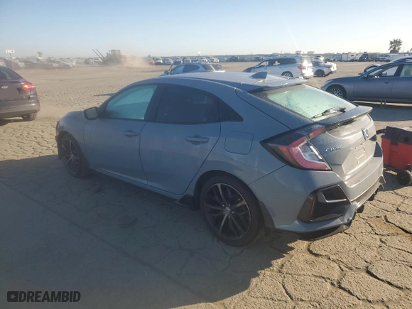 2021 Honda Civic Hatchback Sport with VIN SHHFK7H40MU401106, listed as a Copart auction lot 46873745 with 123,972 mi miles and Salvage Title. Bid and sale history available at carsss.com. Image 2.