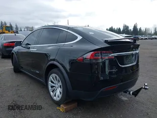 2016 Tesla Model X 70D with VIN 5YJXCBE20GF013046, listed as a IAAI auction lot 41944005 with 94,509 mi miles. Bid and sale history available at carsss.com. Image 3.