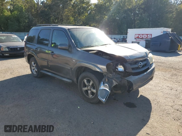 2006 Mazda Tribute S with VIN 4F2YZ06136KM31485, listed as a Copart auction lot 75412344 with Not Provided miles and Salvage Title. Bid and sale history available at DreamBid. Image 4.