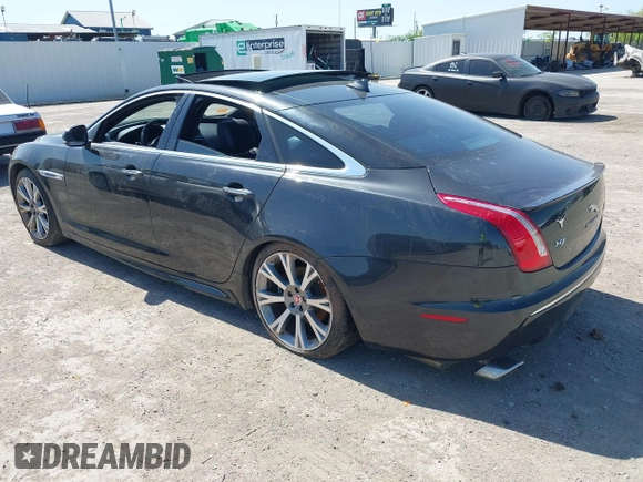 2015 Jaguar XJ R-Sport with VIN SAJWJ1CD6F8V83990, listed as a IAAI auction lot 41936162 with Not Provided miles and . Bid and sale history available at DreamBid. Image 3.