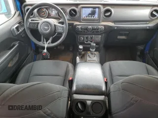 2023 Jeep Wrangler Sport S with VIN 1C4HJXDN3PW503284, listed as a Copart auction lot 51539255 with 31,856 mi miles and Salvage title. Bid and sale history available at DreamBid. Image 8.
