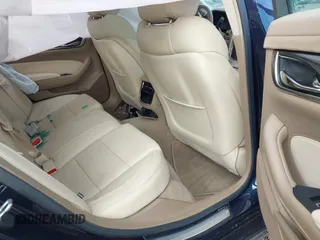 2016 Cadillac CTS Luxury Collection AWD with VIN 1G6AX5SX5G0180953, listed as a IAAI auction lot 41005332 with Not Provided miles and . Bid and sale history available at DreamBid. Image 8.