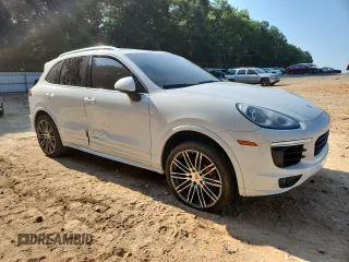 2015 Porsche Cayenne S with VIN WP1AB2A24FLA59813, listed as a Copart auction lot 60604305 with 137,719 mi miles and Salvage title. Bid and sale history available at DreamBid. Image 4.