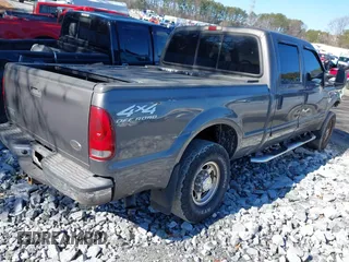 2002 Ford Super Duty F-250 XL with VIN 1FTNW21F52ED15515, listed as a IAAI auction lot 41351889 with 313,722 mi miles. Bid and sale history available at carsss.com. Image 4.
