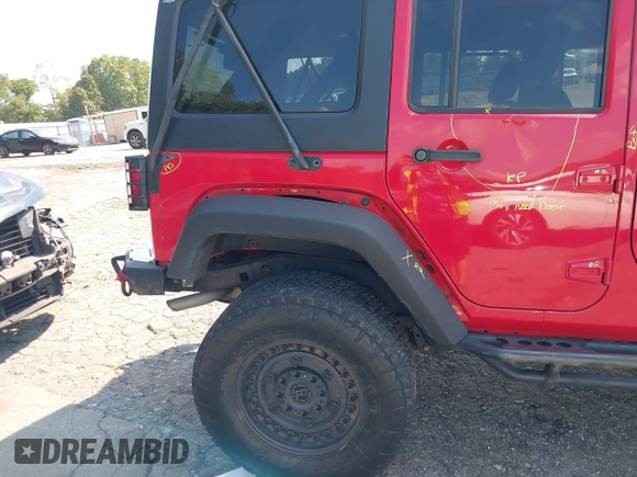 2016 Jeep Wrangler Unlimited Rubicon with VIN 1C4HJWFG7GL128994, listed as a IAAI auction lot 40503403 with 85,950 mi miles. Bid and sale history available at carsss.com. Image 17.