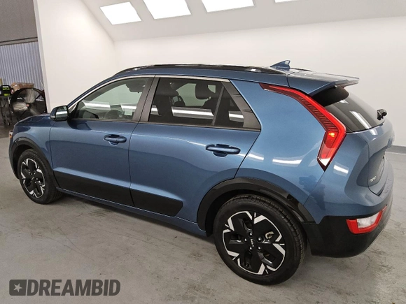 2023 Kia Niro Wind with VIN KNDCR3L1XP5036557, listed as a Copart auction lot 52805055 with 56,357 mi miles and Salvage Title. Bid and sale history available at carsss.com. Image 2.