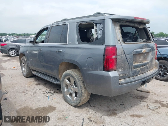 2020 Chevrolet Tahoe LT with VIN 1GNSCBKC1LR103972, listed as a IAAI auction lot 42148438 with 94,640 mi miles and . Bid and sale history available at DreamBid. Image 3.