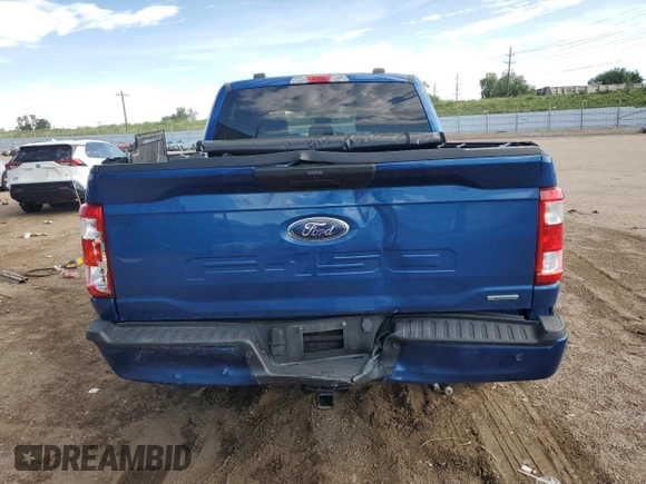 2023 Ford F-150 XL with VIN 1FTEW1EP8PKE04419, listed as a Copart auction lot 60843835 with 31,684 mi miles and Salvage title. Bid and sale history available at DreamBid. Image 6.