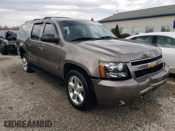 2013 Chevrolet Suburban LT with VIN 1GNSKJE7XDR341736, listed as a Copart auction lot 48781145 with 157,871 mi miles and Salvage Title. Bid and sale history available at DreamBid. Image 4.