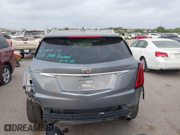 2021 Cadillac XT5 FWD Premium Luxury with VIN 1GYKNCRS5MZ128908, listed as a IAAI auction lot 41919571 with 51,280 mi miles and . Bid and sale history available at carsss.com. Image 6.