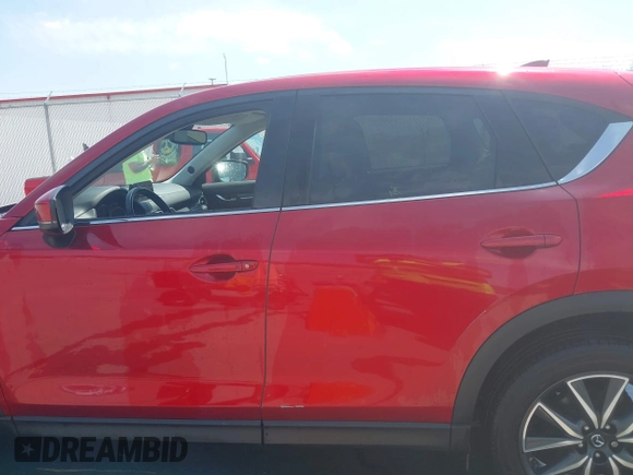 2018 Mazda CX-5 Grand Touring with VIN JM3KFBDM6J0424663, listed as a IAAI auction lot 42003207 with 95,442 mi miles and . Bid and sale history available at DreamBid. Image 14.