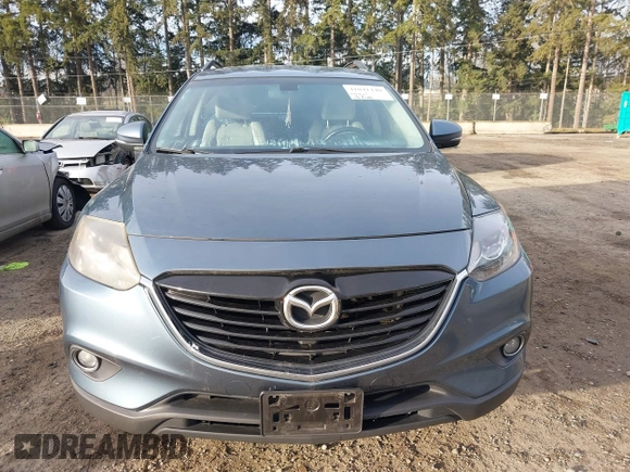 2014 Mazda CX-9 Grand Touring with VIN JM3TB3DV2E0435230, listed as a IAAI auction lot 41041440 with 145,538 mi miles and . Bid and sale history available at DreamBid. Image 13.