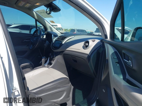 2015 Chevrolet Trax LTZ with VIN KL7CJTSBXFB236823, listed as a IAAI auction lot 42045817 with 138,930 mi miles. Bid and sale history available at carsss.com. Image 5.