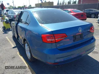 2015 Volkswagen Jetta S with VIN 3VW2K7AJ7FM249112, listed as a IAAI auction lot 42661446 with 124,541 mi miles and . Bid and sale history available at DreamBid. Image 3.