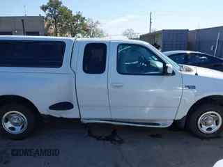 1998 Ford F-150 XL with VIN 1FTZX072XWKA12003, listed as a IAAI auction lot 41765328 with 119,445 mi miles and . Bid and sale history available at DreamBid. Image 13.