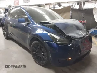 2023 Tesla Model Y Long Range with VIN 7SAYGAEE2PF773382, listed as a IAAI auction lot 42257203 with 32,706 mi miles and . Bid and sale history available at DreamBid. Image 1.