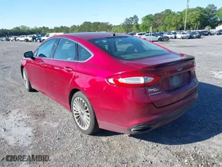 2016 Ford Fusion Titanium with VIN 3FA6P0K94GR373415, listed as a IAAI auction lot 41971956 with 116,654 mi miles. Bid and sale history available at carsss.com. Image 3.