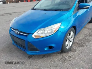 2014 Ford Focus SE z VIN 1FADP3K23EL396126, wystawiony jako IAAI lot #42380189 z przebiegiem 143 298 mil mil oraz . Historia ofert i sprzedaży dostępna na DreamBid. Obrazek 6.