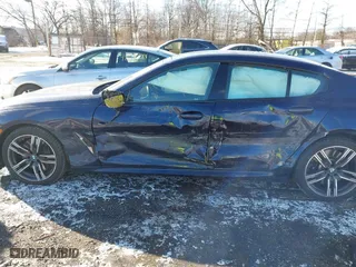 2020 BMW 8 Series 840i with VIN WBAGV4C01LCD97854, listed as a IAAI auction lot 41263040 with 66,935 mi miles. Bid and sale history available at carsss.com. Image 6.