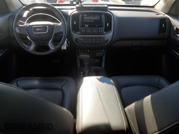 2021 GMC Canyon 4WD AT4 w/Leather with VIN 1GTG6FEN4M1155641, listed as a Copart auction lot 86793644 with 36,940 mi miles and Salvage Title. Bid and sale history available at carsss.com. Image 8.