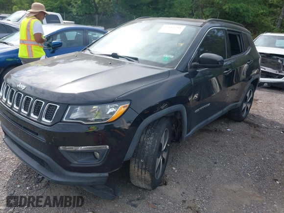 2018 Jeep Compass Latitude with VIN 3C4NJCBB8JT124640, listed as a IAAI auction lot 42182791 with 179,376 mi miles and . Bid and sale history available at DreamBid. Image 2.