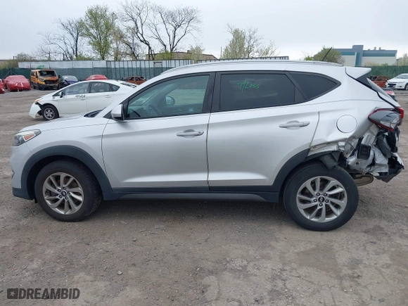 2016 Hyundai Tucson SE with VIN KM8J33A44GU187515, listed as a IAAI auction lot 42015707 with 89,948 mi miles. Bid and sale history available at carsss.com. Image 14.
