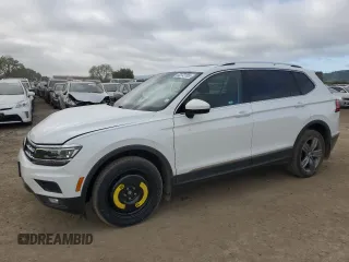 2019 Volkswagen Tiguan SEL Premium with VIN 3VV4B7AX9KM156202, listed as a Copart auction lot 52372185 with 76,777 mi miles and Salvage Title. Bid and sale history available at DreamBid. Image 1.