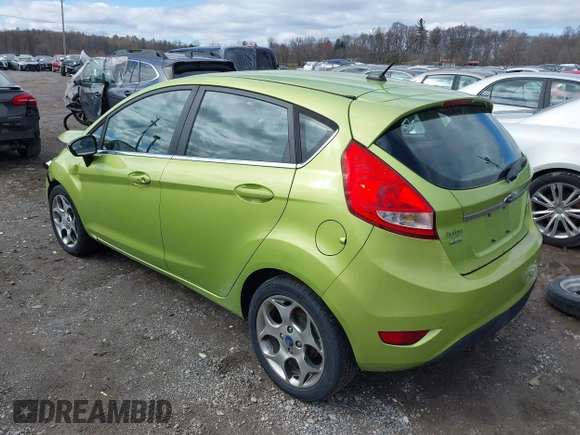 2011 Ford Fiesta SES with VIN 3FADP4FJ7BM131503, listed as a IAAI auction lot 41804351 with 233,620 mi miles. Bid and sale history available at carsss.com. Image 3.