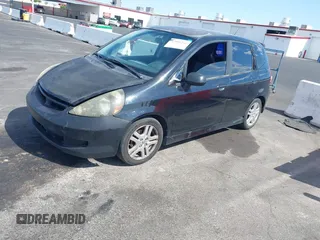 2008 Honda Fit Sport with VIN JHMGD386X8S052358, listed as a IAAI auction lot 42090261 with 291,211 mi miles. Bid and sale history available at carsss.com. Image 2.