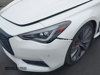 2021 Infiniti Q60 Red Sport 400 with VIN JN1FV7LK1MM530013, listed as a IAAI auction lot 41461752 with 52,844 mi miles and . Bid and sale history available at DreamBid. Image 6.