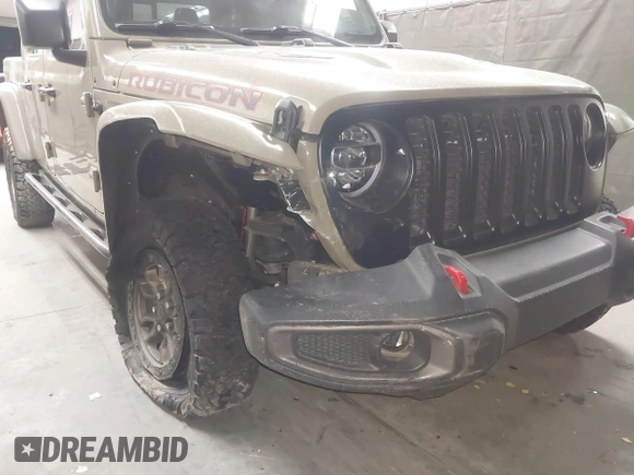 2020 Jeep Gladiator Rubicon z VIN 1C6JJTBGXLL178893, wystawiony jako IAAI lot #42206863 z przebiegiem 29 138 mil mil oraz . Historia ofert i sprzedaży dostępna na DreamBid. Obrazek 6.