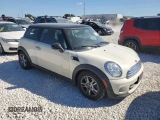 2013 MINI Hardtop with VIN WMWSU3C56DT682857, listed as a Copart auction lot 77677234 with 92,625 mi miles and Clean Title. Bid and sale history available at DreamBid. Image 4.